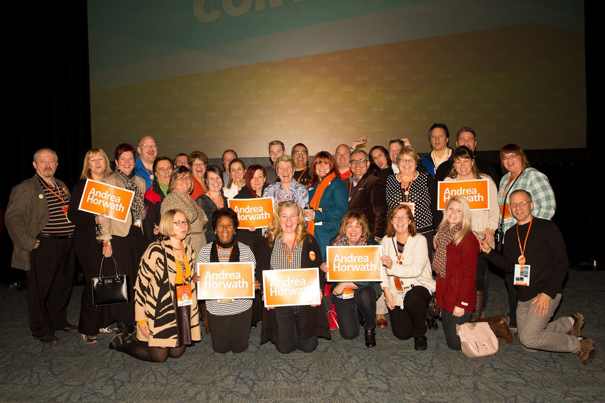 Large group of OPSEU members, many holding Andrea Horwath signs, at the ONDP Convention