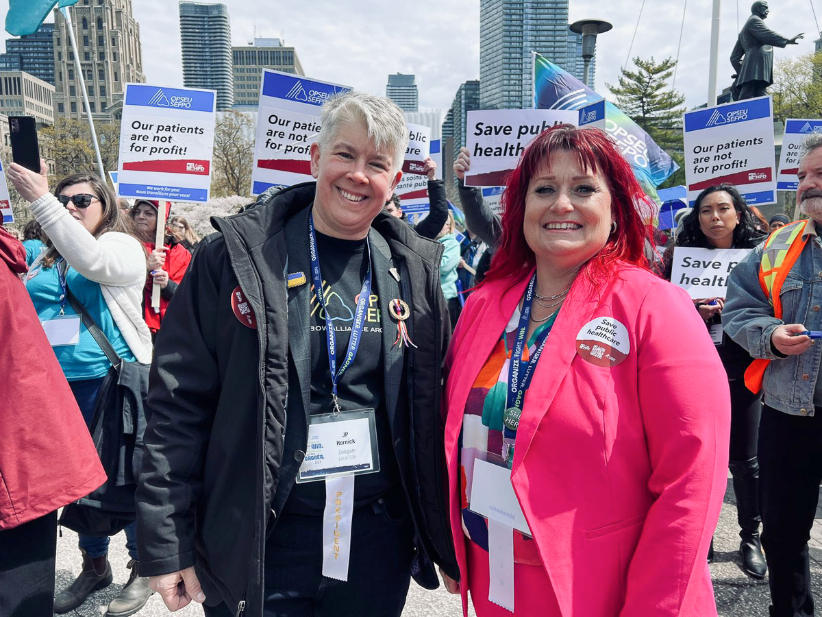 OPSEU/SEFPO Hospital Professionals Division Chair Sara Labelle (r) and President JP Hornick join members at Queen's Park to support public health care.